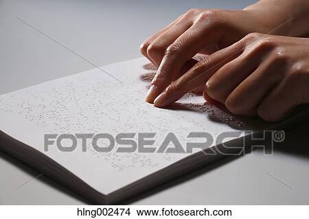 Hands reading Braille paper View Large Photo Image Picture - Hands reading Braille paper. Fotosearch