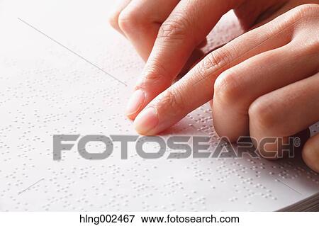 Hands reading Braille paper View Large Photo Image Stock Photo - Hands reading Braille paper. Fotosearch