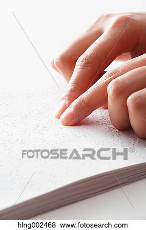 Hands reading Braille paper View Large Photo Image Stock Photo - Hands reading Braille paper. Fotosearch