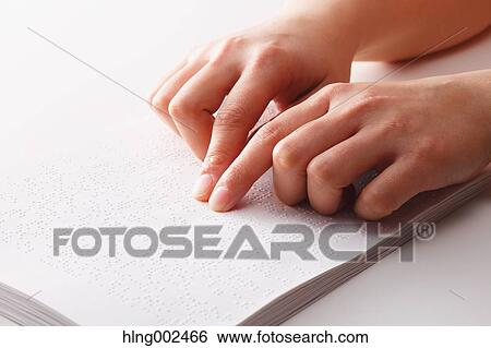 Hands reading Braille paper View Large Photo Image Stock Photograph - Hands reading Braille paper. Fotosearch