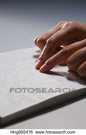 Hands reading Braille paper View Large Photo Image Stock Photograph - Hands reading Braille paper. Fotosearch