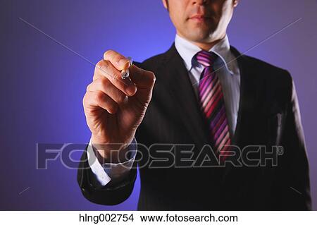 Japanese businessman using virtual reality device View Large Photo Image Picture - Japanese businessman using virtual reality device. Fotosearch