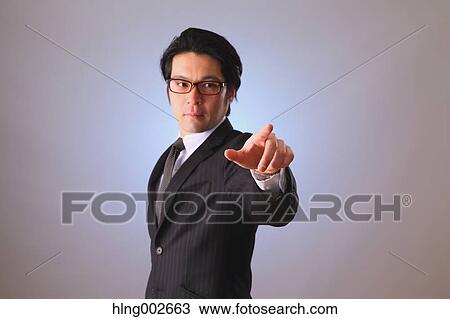 Japanese businessman using virtual reality device View Large Photo Image Stock Image - Japanese businessman using virtual reality device. Fotosearch