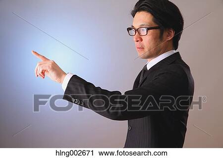 Japanese businessman using virtual reality device View Large Photo Image Stock Image - Japanese businessman using virtual reality device. Fotosearch