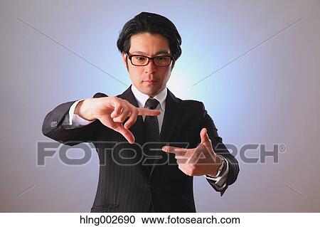 Japanese businessman using virtual reality device View Large Photo Image Stock Image - Japanese businessman using virtual reality device. Fotosearch