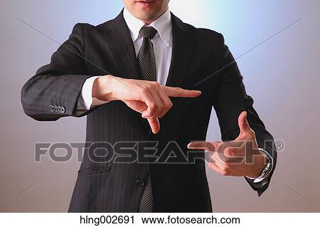 Japanese businessman using virtual reality device View Large Photo Image Stock Image - Japanese businessman using virtual reality device. Fotosearch
