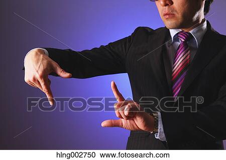 Japanese businessman using virtual reality device View Large Photo Image Stock Image - Japanese businessman using virtual reality device. Fotosearch