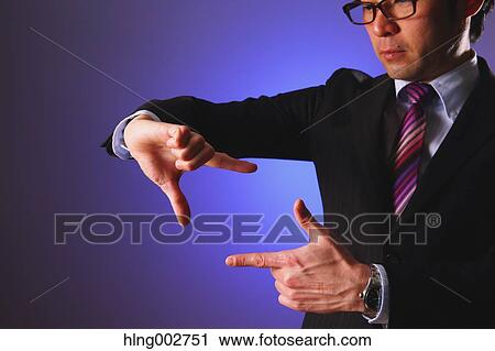 Japanese businessman using virtual reality device View Large Photo Image Stock Image - Japanese businessman using virtual reality device. Fotosearch
