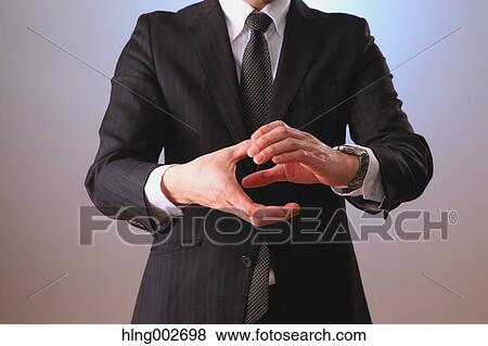 Japanese businessman using virtual reality device View Large Photo Image Stock Photo - Japanese businessman using virtual reality device. Fotosearch