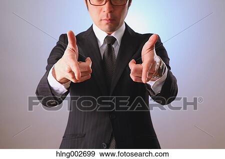 Japanese businessman using virtual reality device View Large Photo Image Stock Photo - Japanese businessman using virtual reality device. Fotosearch