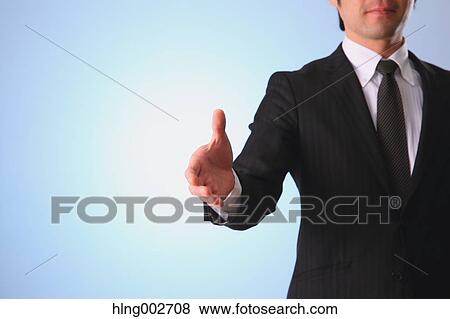 Japanese businessman using virtual reality device View Large Photo Image Stock Photo - Japanese businessman using virtual reality device. Fotosearch