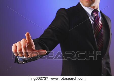 Japanese businessman using virtual reality device View Large Photo Image Stock Photo - Japanese businessman using virtual reality device. Fotosearch