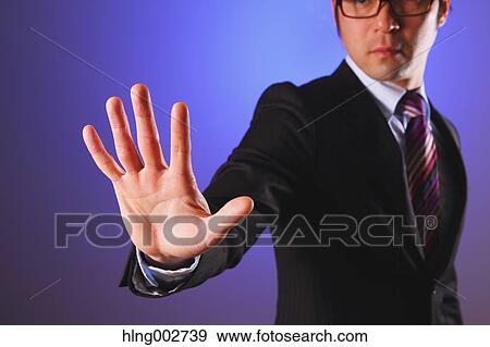 Japanese businessman using virtual reality device View Large Photo Image Stock Photo - Japanese businessman using virtual reality device. Fotosearch