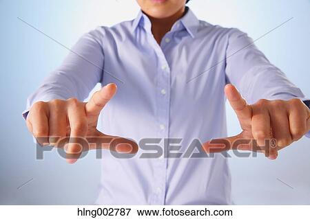 Japanese businessman using virtual reality device View Large Photo Image Stock Photo - Japanese businessman using virtual reality device. Fotosearch