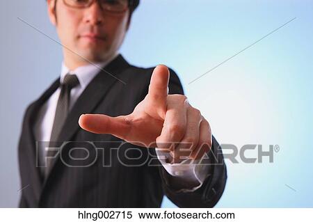 Japanese businessman using virtual reality device View Large Photo Image Stock Photography - Japanese businessman using virtual reality device. Fotosearch