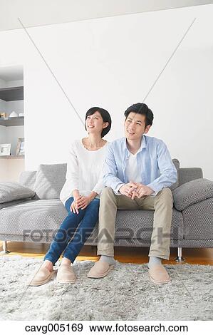Japanese couple on the sofa View Large Photo Image Stock Photo - Japanese couple on the sofa. Fotosearch