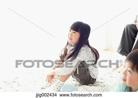 Japanese family in the living room View Large Photo Image Picture - Japanese family in the living room. Fotosearch