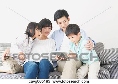 Japanese family on the sofa View Large Photo Image Stock Image - Japanese family on the sofa. Fotosearch