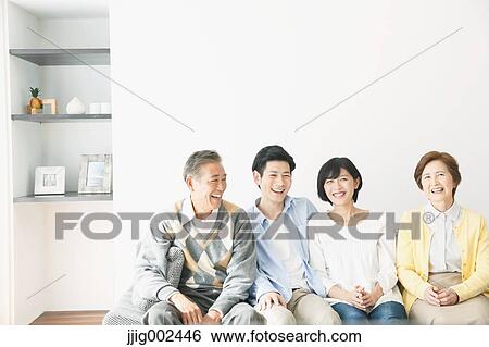 Japanese family on the sofa View Large Photo Image Stock Photograph - Japanese family on the sofa. Fotosearch