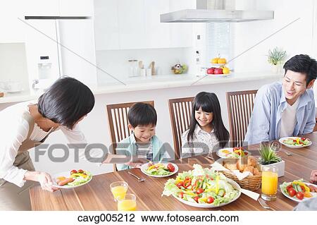Japanese family together in the kitchen View Large Photo Image Stock Image - Japanese family together in the kitchen. Fotosearch