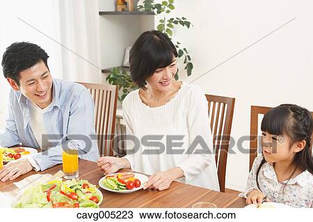 Japanese family together in the kitchen View Large Photo Image Stock Image - Japanese family together in the kitchen. Fotosearch