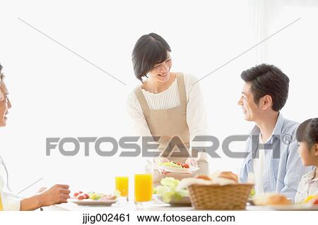 Japanese family together in the kitchen View Large Photo Image Stock Image - Japanese family together in the kitchen. Fotosearch