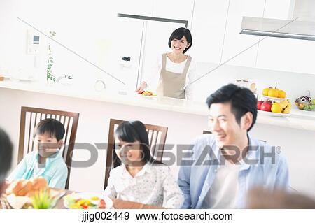 Japanese family together in the kitchen View Large Photo Image Stock Photo - Japanese family together in the kitchen. Fotosearch