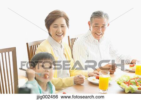 Japanese family together in the kitchen View Large Photo Image Stock Photograph - Japanese family together in the kitchen. Fotosearch