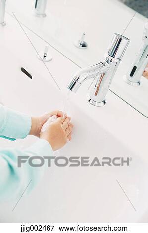 Japanese kid washing hands in the bathroom View Large Photo Image Stock Photo - Japanese kid washing hands in the bathroom. Fotosearch