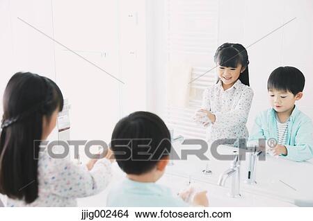 Japanese kids washing hands in the bathroom View Large Photo Image Picture - Japanese kids washing hands in the bathroom. Fotosearch