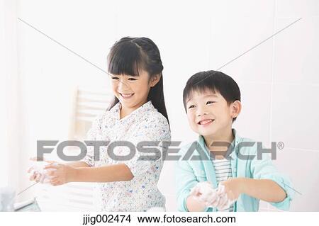 Japanese kids washing hands in the bathroom View Large Photo Image Picture - Japanese kids washing hands in the bathroom. Fotosearch