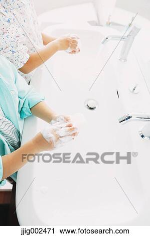 Japanese kids washing hands in the bathroom View Large Photo Image Stock Image - Japanese kids washing hands in the bathroom. Fotosearch