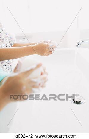 Japanese kids washing hands in the bathroom View Large Photo Image Stock Image - Japanese kids washing hands in the bathroom. Fotosearch