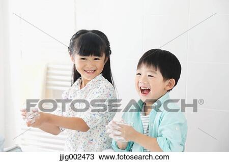 Japanese kids washing hands in the bathroom View Large Photo Image Stock Image - Japanese kids washing hands in the bathroom. Fotosearch