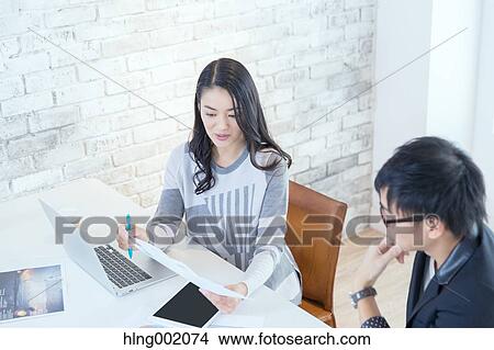 Japanese people working in modern office View Large Photo Image Picture - Japanese people working in modern office. Fotosearch