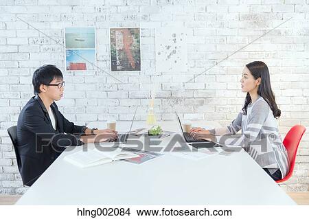Japanese people working in modern office View Large Photo Image Picture - Japanese people working in modern office. Fotosearch