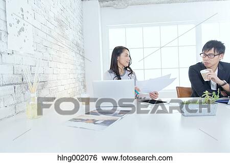Japanese people working in modern office View Large Photo Image Stock Photograph - Japanese people working in modern office. Fotosearch