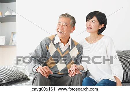 Japanese senior and daughter on the sofa View Large Photo Image Stock Image - Japanese senior and daughter on the sofa. Fotosearch