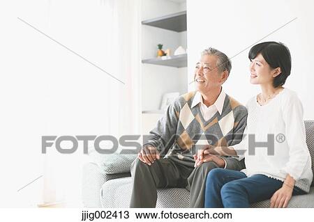 Japanese senior and daughter on the sofa View Large Photo Image Stock Image - Japanese senior and daughter on the sofa. Fotosearch