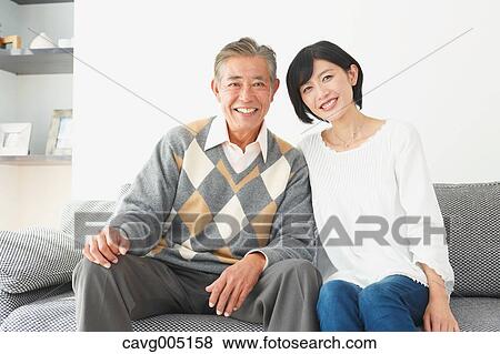 Japanese senior and daughter on the sofa View Large Photo Image Stock Photo - Japanese senior and daughter on the sofa. Fotosearch