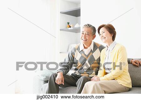 Japanese senior couple on the sofa View Large Photo Image Stock Image - Japanese senior couple on the sofa. Fotosearch