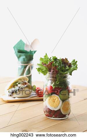 Stock Image - Jar salad. Fotosearch