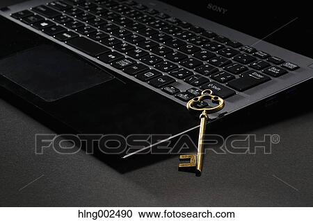 Key and laptop View Large Photo Image Stock Image - Key and laptop. Fotosearch