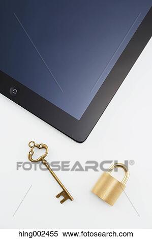 Key safety lock and tablet View Large Photo Image Stock Photography - Key safety lock and tablet. Fotosearch