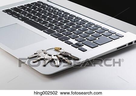 Keys and laptop View Large Photo Image Stock Image - Keys and laptop. Fotosearch