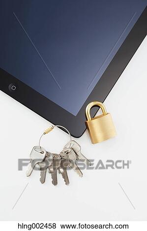 Keys safety lock and tablet View Large Photo Image Stock Photo - Keys safety lock and tablet. Fotosearch