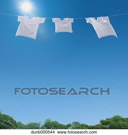 Laundry drying up on washing line View Large Photo Image Picture - Laundry drying up on washing line. Fotosearch