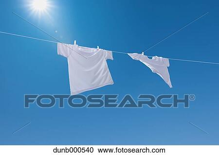 Laundry drying up on washing line View Large Photo Image Stock Image - Laundry drying up on washing line. Fotosearch