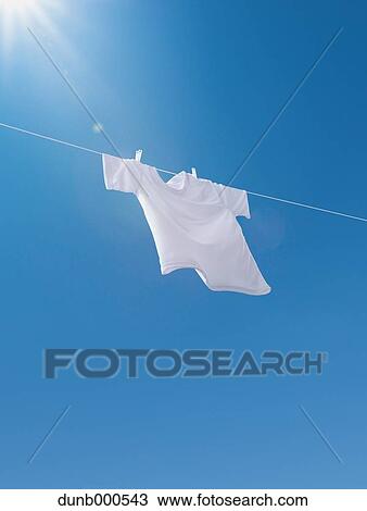 Laundry drying up on washing line View Large Photo Image Stock Image - Laundry drying up on washing line. Fotosearch