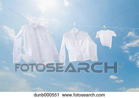 Laundry drying up on washing line View Large Photo Image Stock Image - Laundry drying up on washing line. Fotosearch